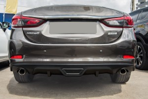 MAZDA 6 III GJ 2014-2018 SEDAN PO PIERWSZYM FACELIFTINGU ZAŚLEPKA TYLNEGO ZDERZAKA LEWA GJR950EL1